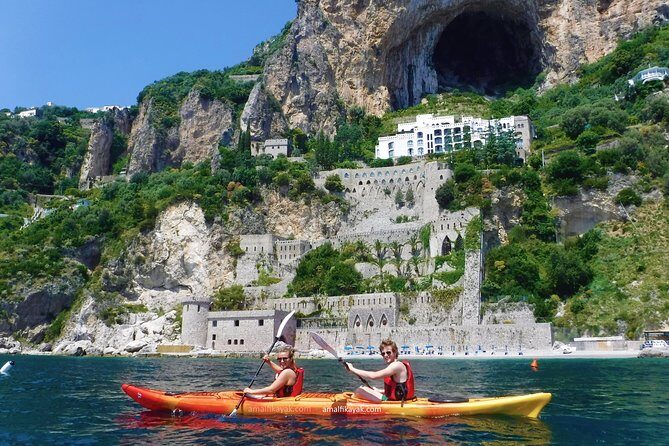 Amalfi Coast Kayak Tour: Explore Caves, Arches & Hidden Beaches - Guide photos, melon treats, and the little perks that actually matter