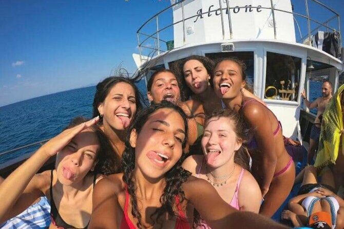 Boat excursion with lunch on board to discover Ischia - Punta Imperatore: Lucia Capuano and the lighthouse on the rocks