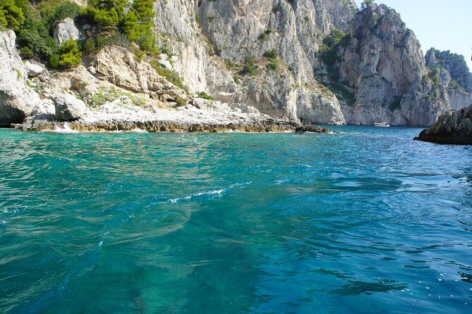 Capri & Blue Grotto Small Group Full-Day Boat Tour from Positano - Swimming and snorkel time, towels on board, and the Prosecco return