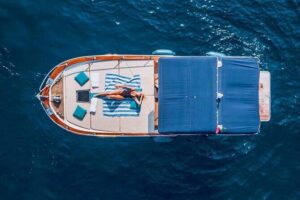 Capri excursion in a private boat - Departing toward Marina Piccola and the Cave of the Sailors