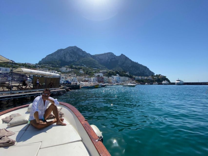 Capri: Island and Grottos Boat Cruise with Snacks and Drinks - Faraglioni, Malaparte, and Punta Carena: the landmarks from sea level