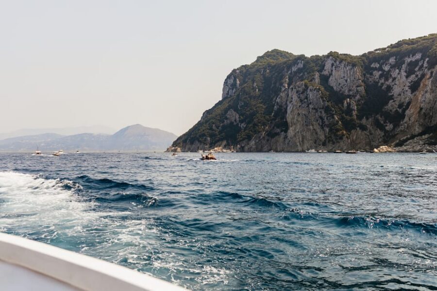 Capri: Island Boat Tour and Optional Blue Grotto Visit - The Grotto Experience: Rowboat Ride, Cave Time, and Photo Moments