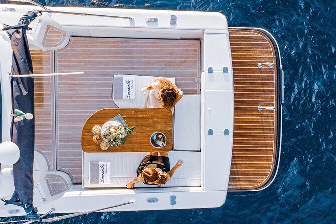 Capri Private Boat Tour with Limoncello tasting - Bagni Regina Giovanna: swimming in a natural pool by ruins