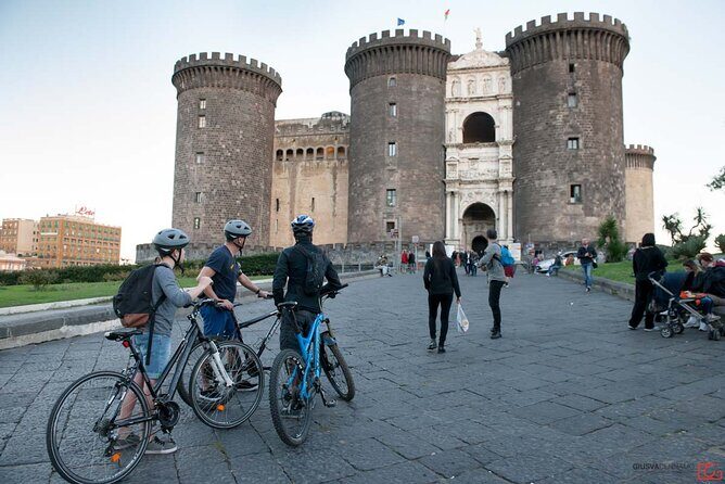 Central Naples Bike Tour - Palazzo Reale: dynasties you can read on the facade