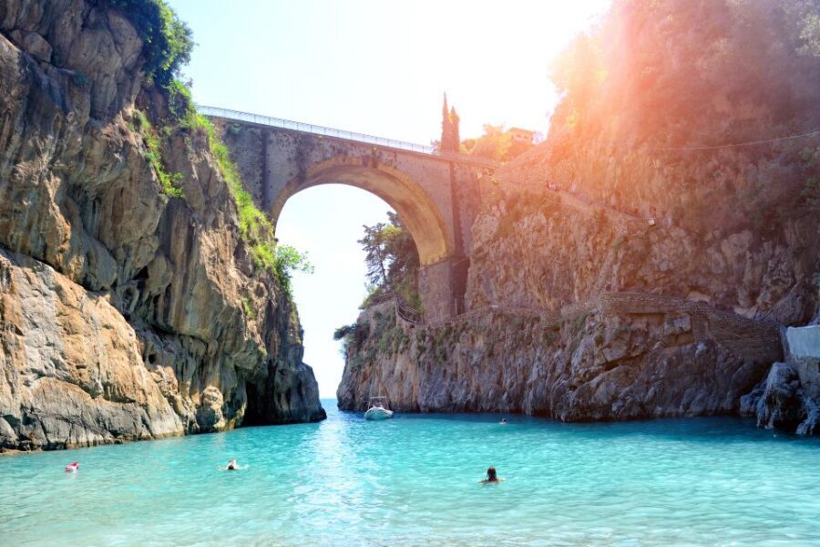 From Naples: Boat Tour to Capri Island with Aperitiv - Capri from the water: caves, cliffs, and the Faraglioni moments
