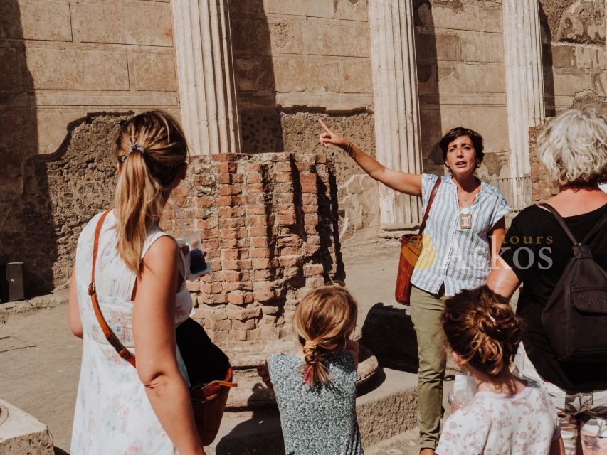 From Naples: Pompeii & Herculaneum with Archaeologist Guide - Herculaneum: the preserved town under 20 meters of mud