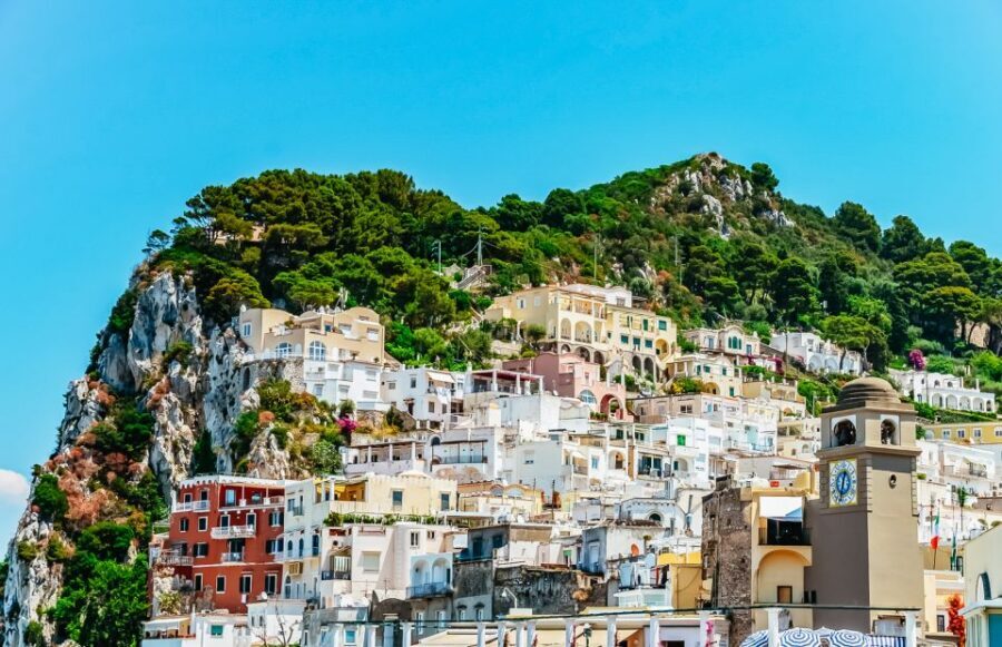 From Sorrento: Capri Guided Boat Tour - The ride out: coast views, then crossing toward Capri