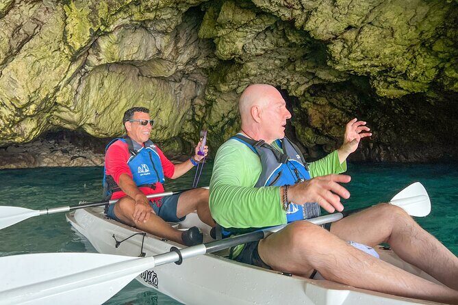 Kayak tour in Capri between caves and beaches. Photos included. - What to bring: small items that prevent a miserable wet-day