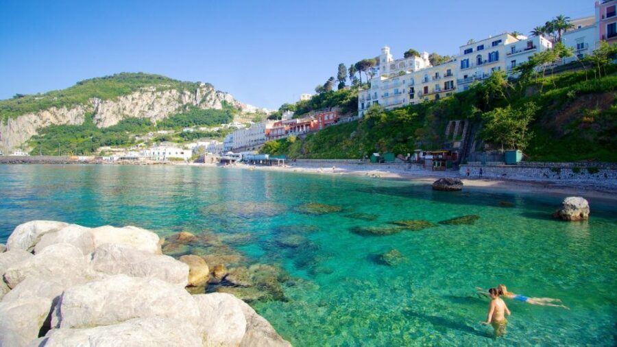 Naples: Capri Transfer with Island Boat Tour and Free Time - The 1-Hour Guided Boat Tour: Faraglioni, Coves, and Blue Grotto From the Sea