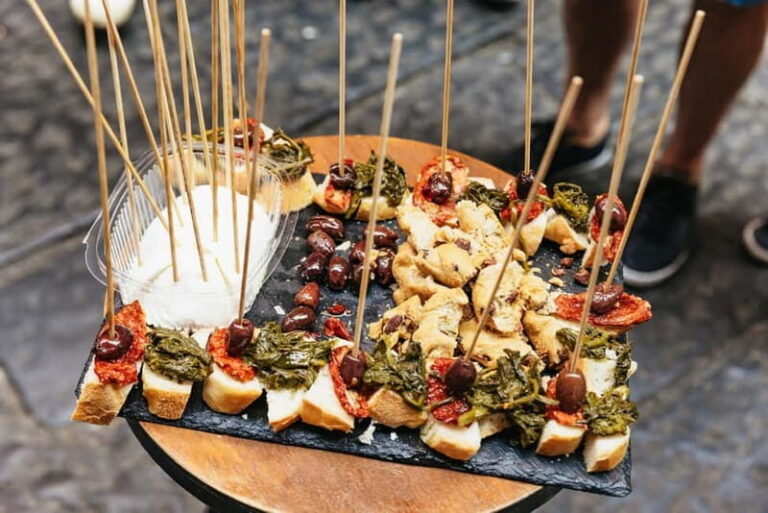 Naples: Guided Street Food Tour with Spritz - Where the tour begins: Piazza Bellini and the Greek ruins on the ground