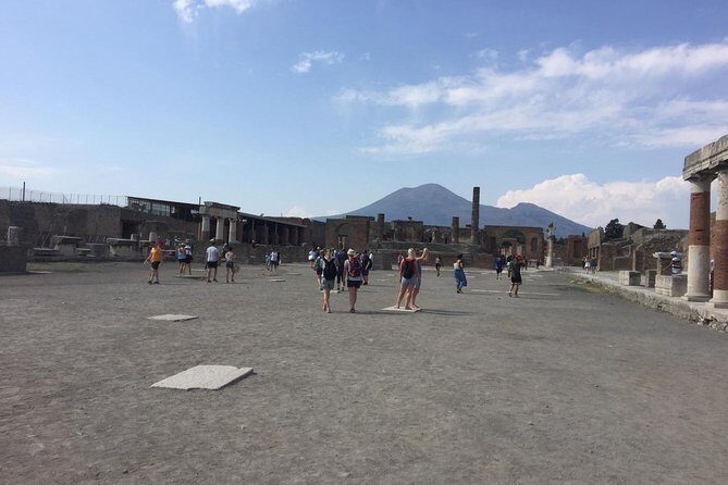 Pompeii and Sorrento Day Trip from Naples - Pompeii entrance and the guided walk: Forum, Thermal Baths, Lupanare