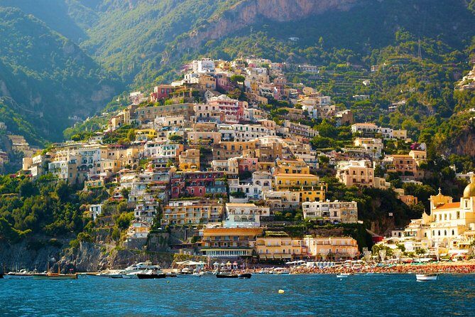 Positano & Amalfi Boat Tour from Naples with Light Lunch - Swimming and lunch onboard: snacks, Caprese, and limoncello toast