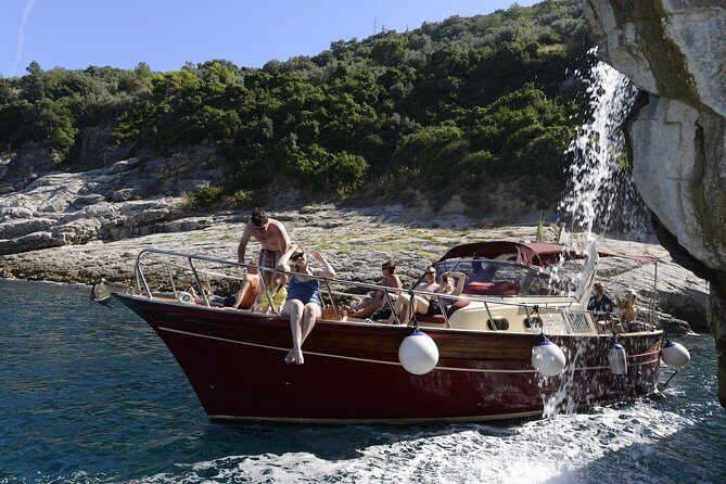 Small Group Boat Tour Capri & Blue Grotto with Swimming Stops - Blue Grotto reality check: fee, wait, and safety conditions