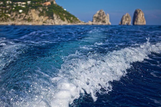 Small Group Capri Island Boat Ride with Swimming and Limoncello - Cruising Past Punta Carena Lighthouse and Back to Marina Grande