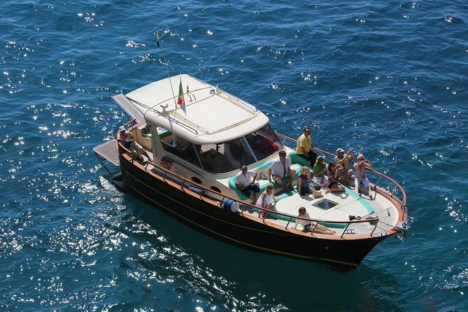 Small Group Ischia and Procida Boat Day Tour from Sorrento - Onboard food and drinks: the caprese lunch and the limoncello finish