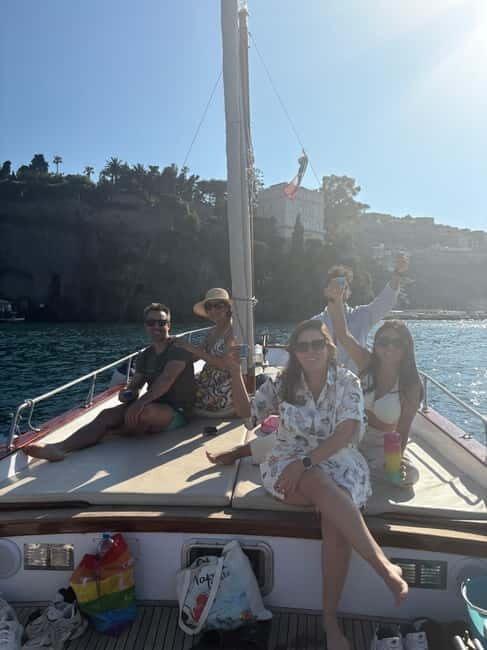 Sorrento: Boat Coastal Cruise with Swim and Limoncello - The Gozzo Fratelli Aprea Boat and the Views It Creates